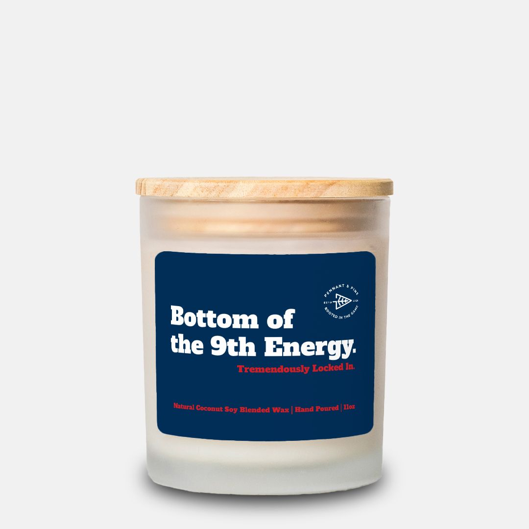 Candle with a blue label on a white background
