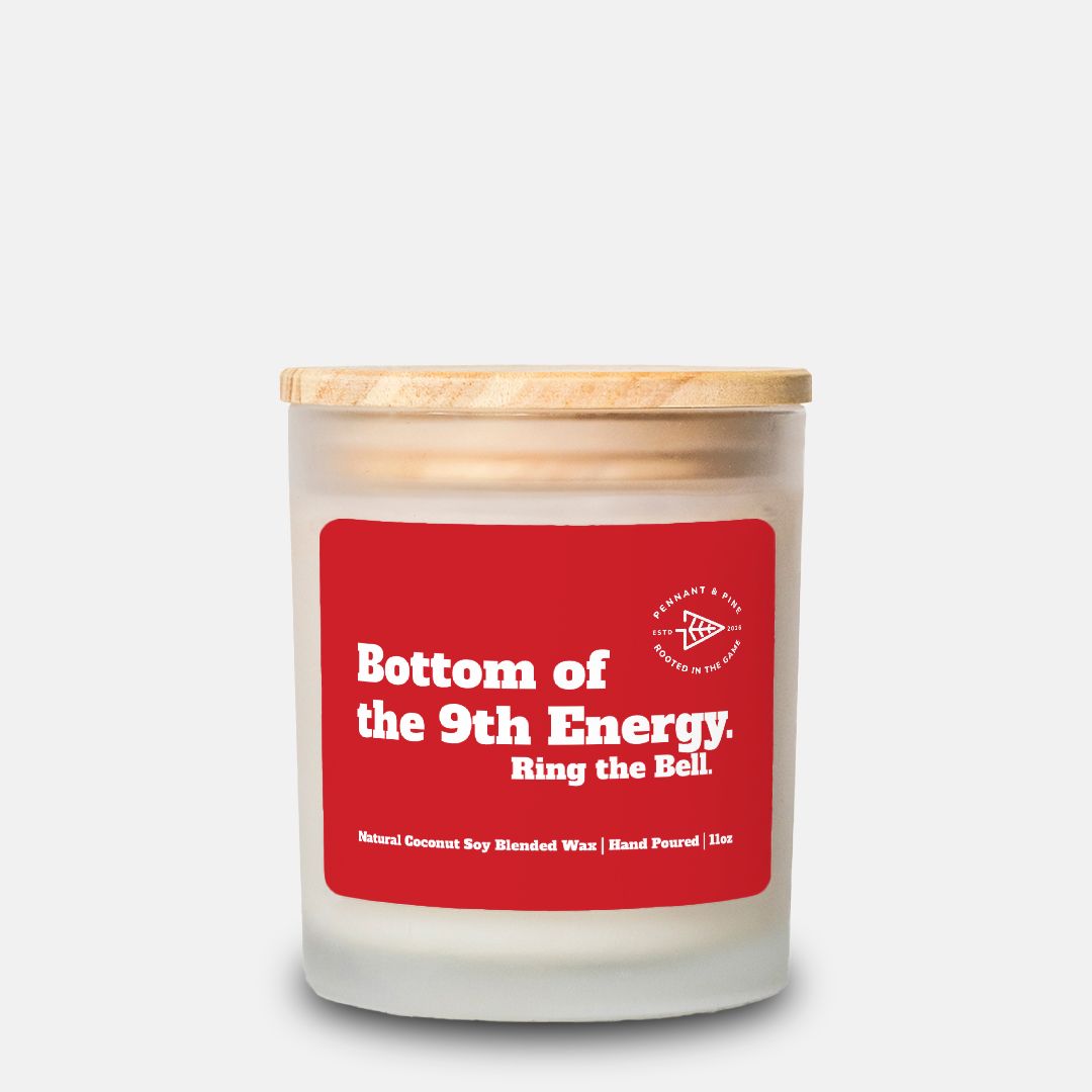 Candle with a red label on a white background