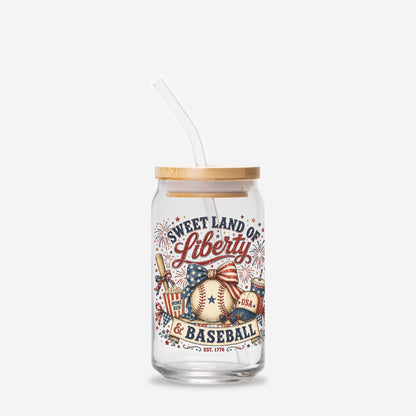 Glass tumbler with straw featuring 'Sweet Land of Liberty & Baseball' design on a white background