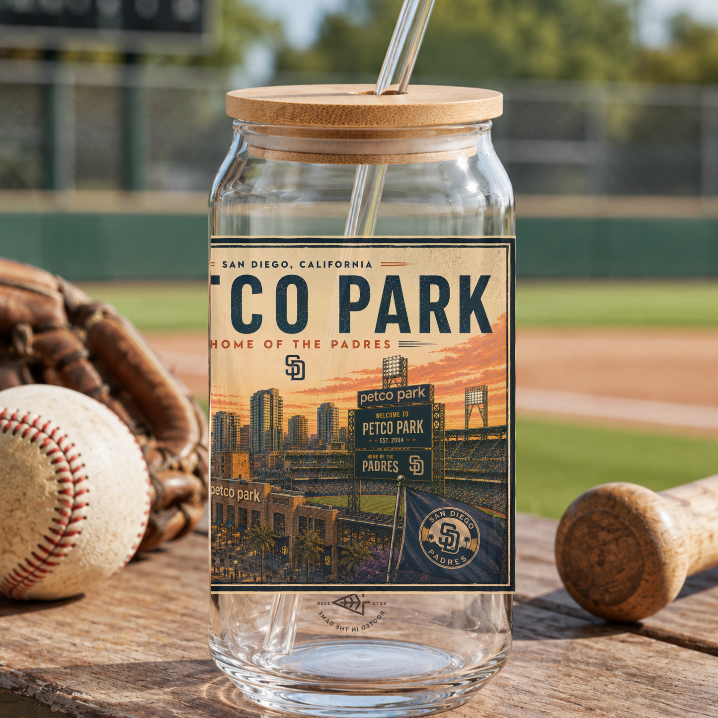Glass tumbler with wooden lid on a baseball field, featuring 'Peco Park' design.