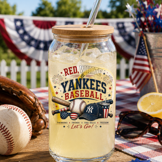 Glass jar with 'Red, White & Yankees Baseball' design on a table with baseball-themed items.