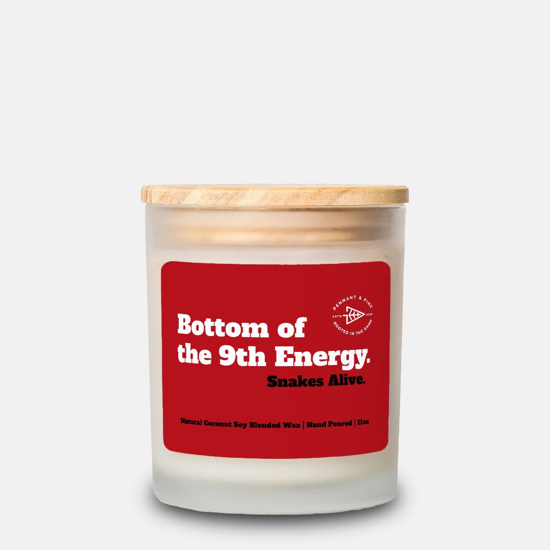 Candle with a red label on a white background