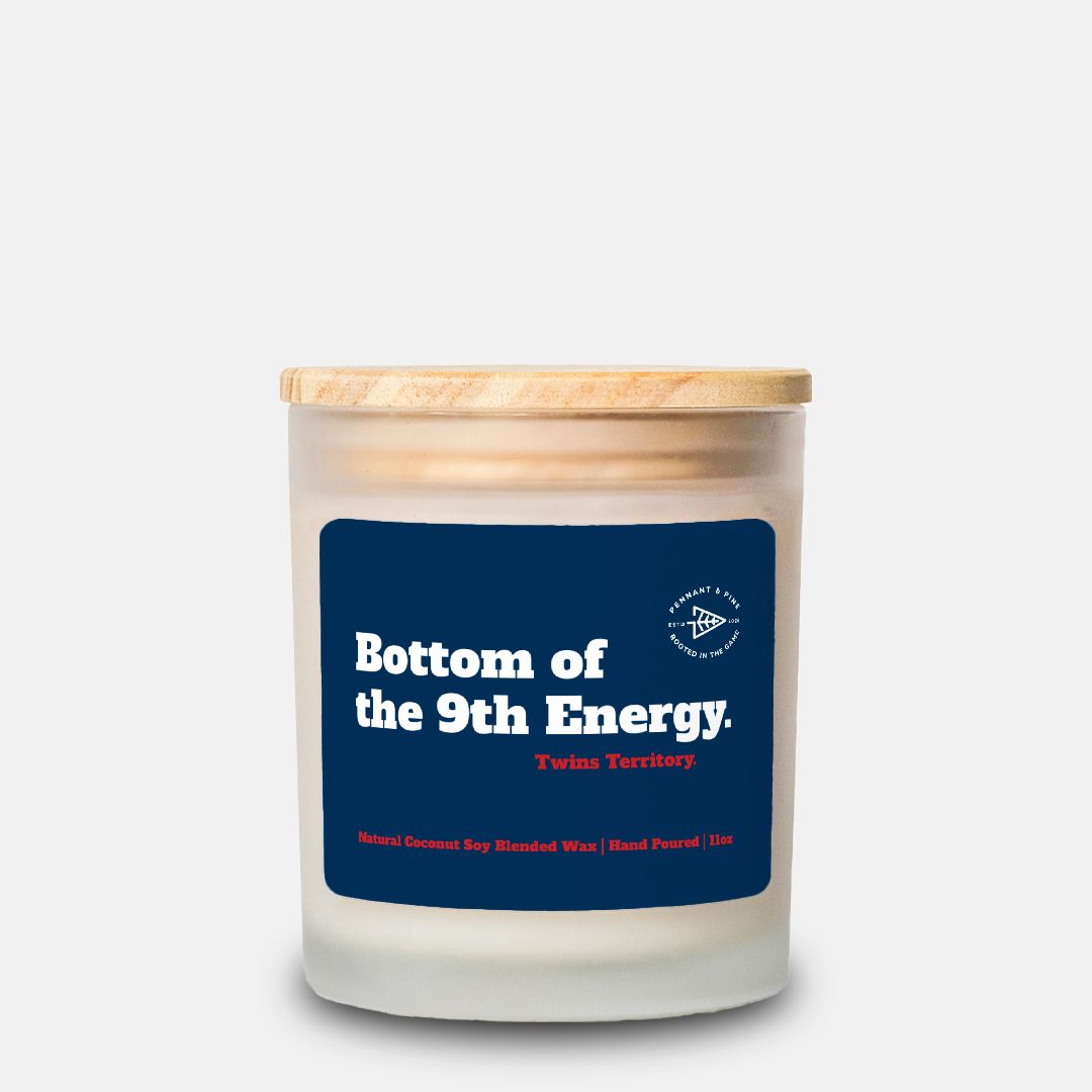 Candle with a blue label on a white background