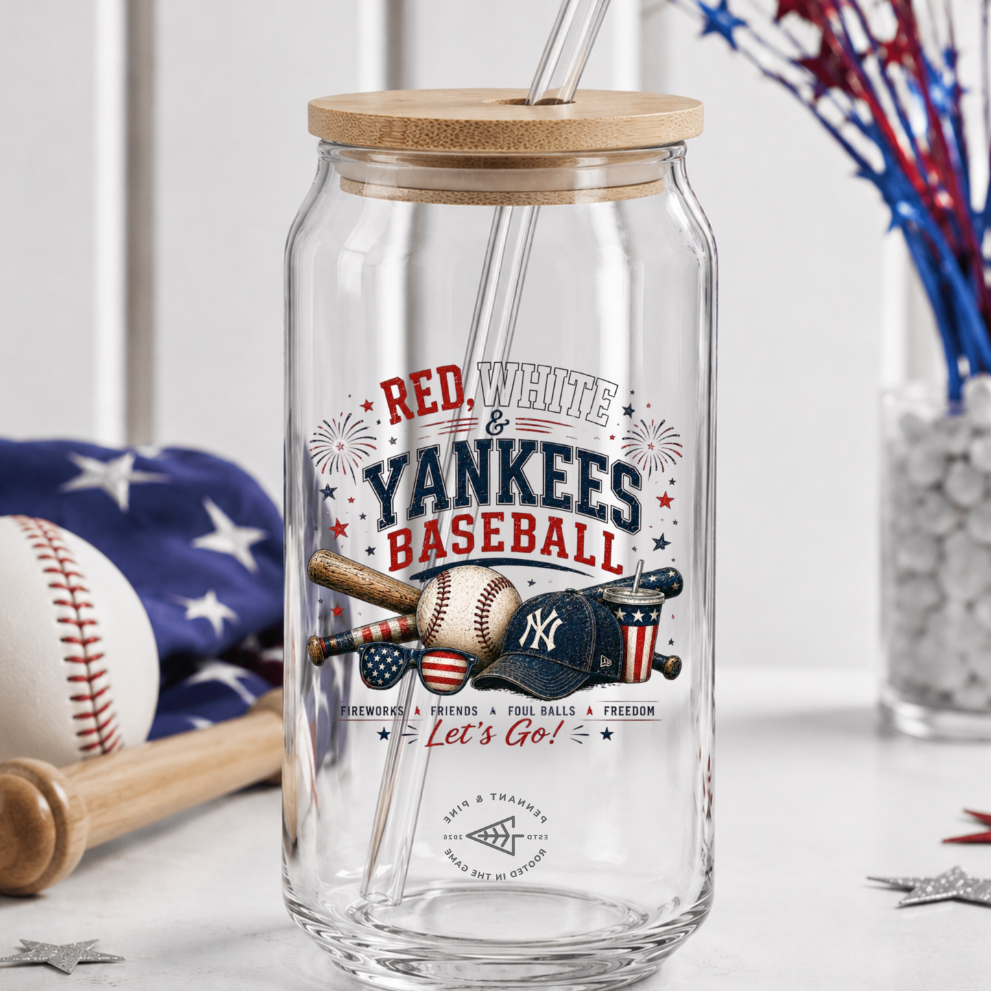 Clear glass tumbler with wooden lid and straw, featuring 'Red, White & Yankees Baseball' design.