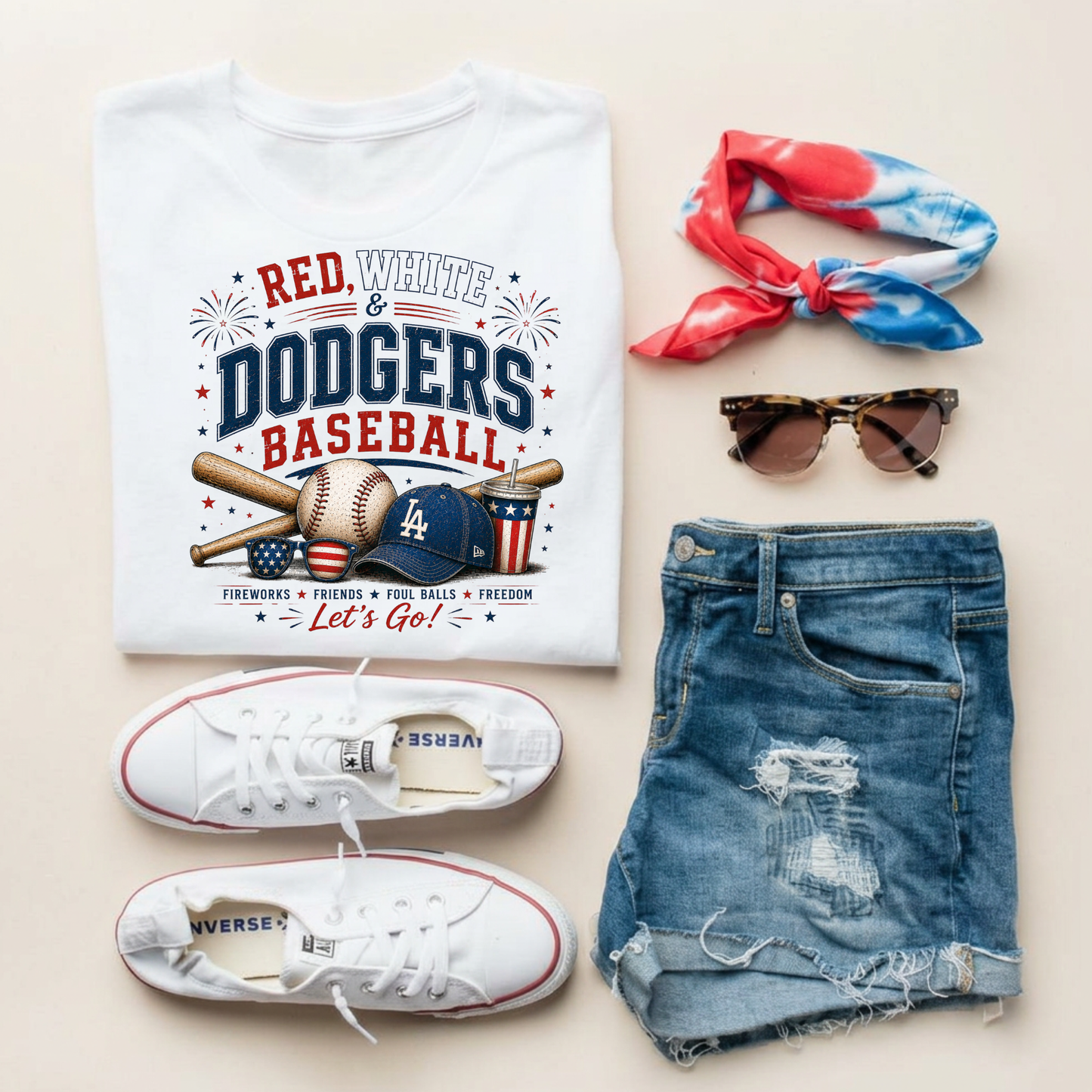 Baseball-themed t-shirt with accessories on a light background