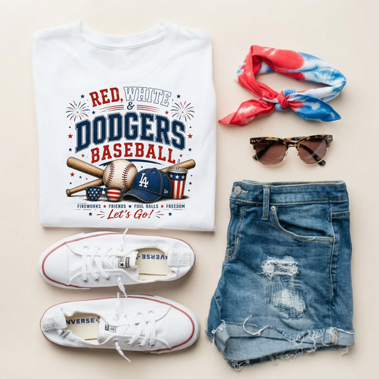 Baseball-themed t-shirt with accessories on a light background