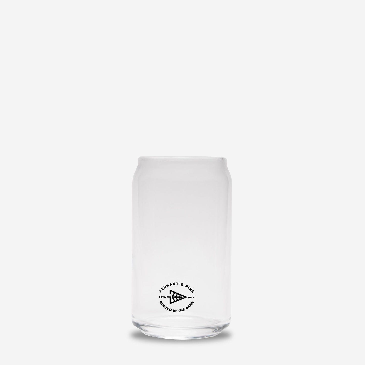 Clear glass tumbler with black text on a white background