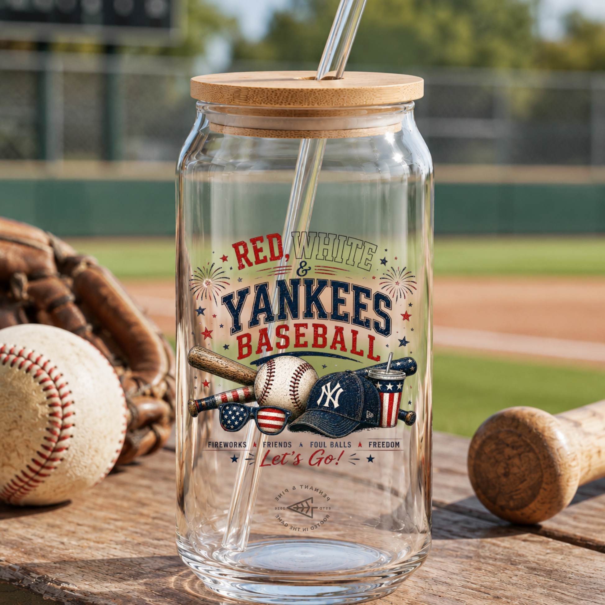 Glass tumbler with wooden lid and straw on a baseball field background