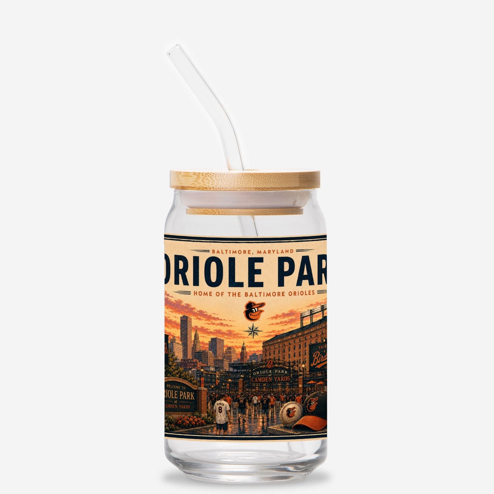 Clear tumbler with wooden lid and Orioles Park label on a white background