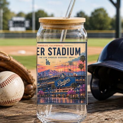 Glass jar with lid featuring Los Angeles Dodgers stadium label, baseball, glove, and helmet on a wooden surface with a baseball field background.