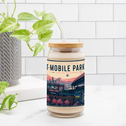 Drinking Glass with 'T-MOBILE PARK' label on a white surface with a plant in the background
