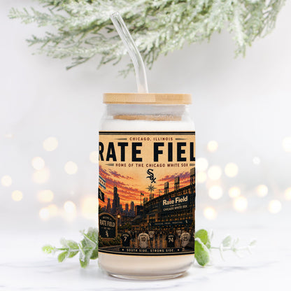 Jar with a lid and straw, featuring 'Rate Field' branding on a white background with blurred lights and greenery.