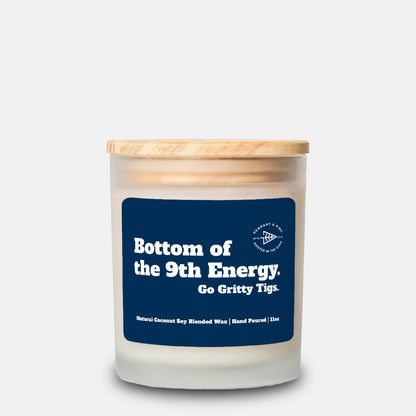 Candle with a blue label on a white background