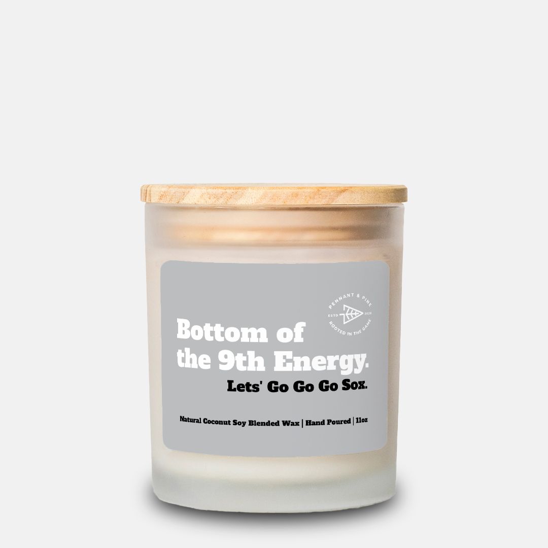 Candle with a wooden lid and gray label on a white background