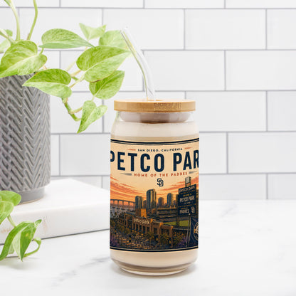 Jar with a label featuring 'Petco Park' on a white surface with a plant in the background