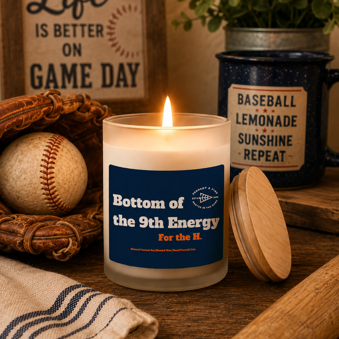 Candle with a label on a table with sports-themed decor