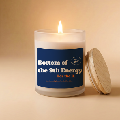 Candle with a blue label on a beige background