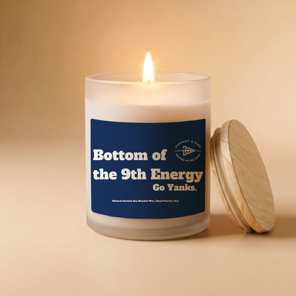Candle with a blue label on a beige background