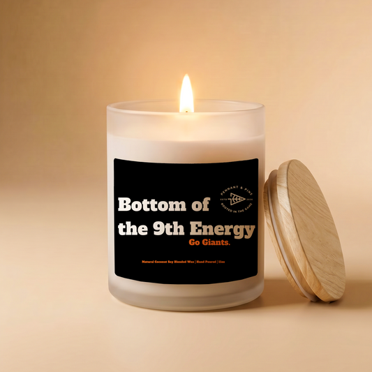Candle with a label on a beige background