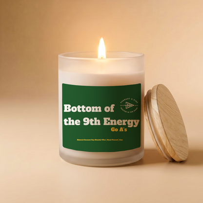 Candle with a green label on a beige background