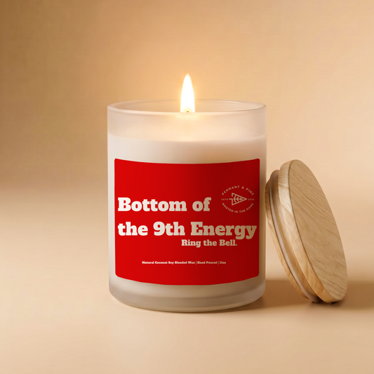 Candle with a red label on a beige background