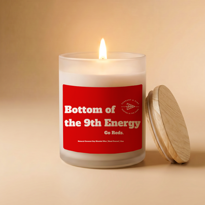 Candle with a red label on a beige background