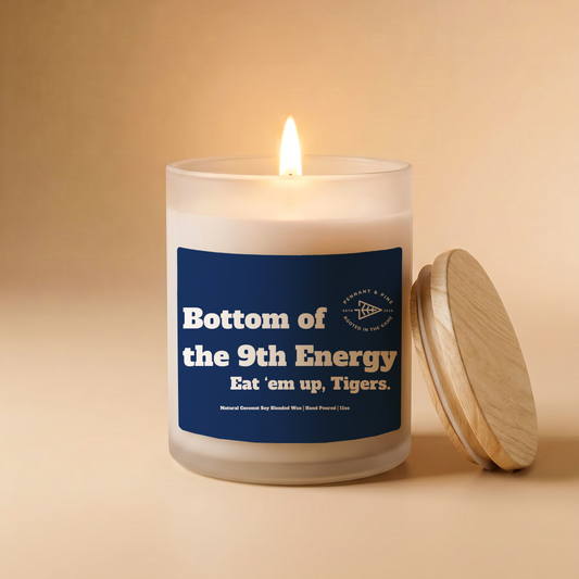 Candle with a purple label on a beige background