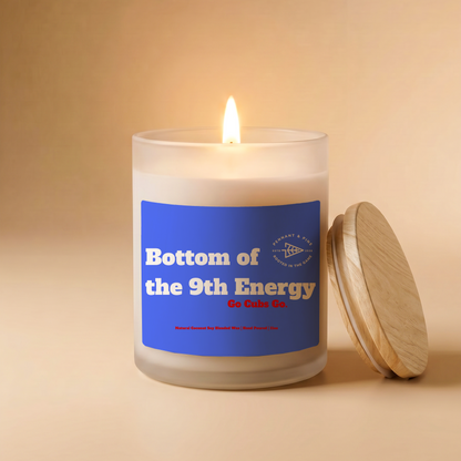 Candle with a blue label on a beige background