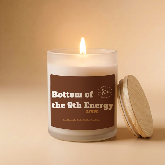 Candle with a label on a beige background