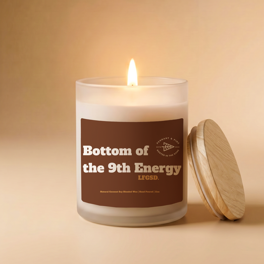 Candle with a label on a beige background