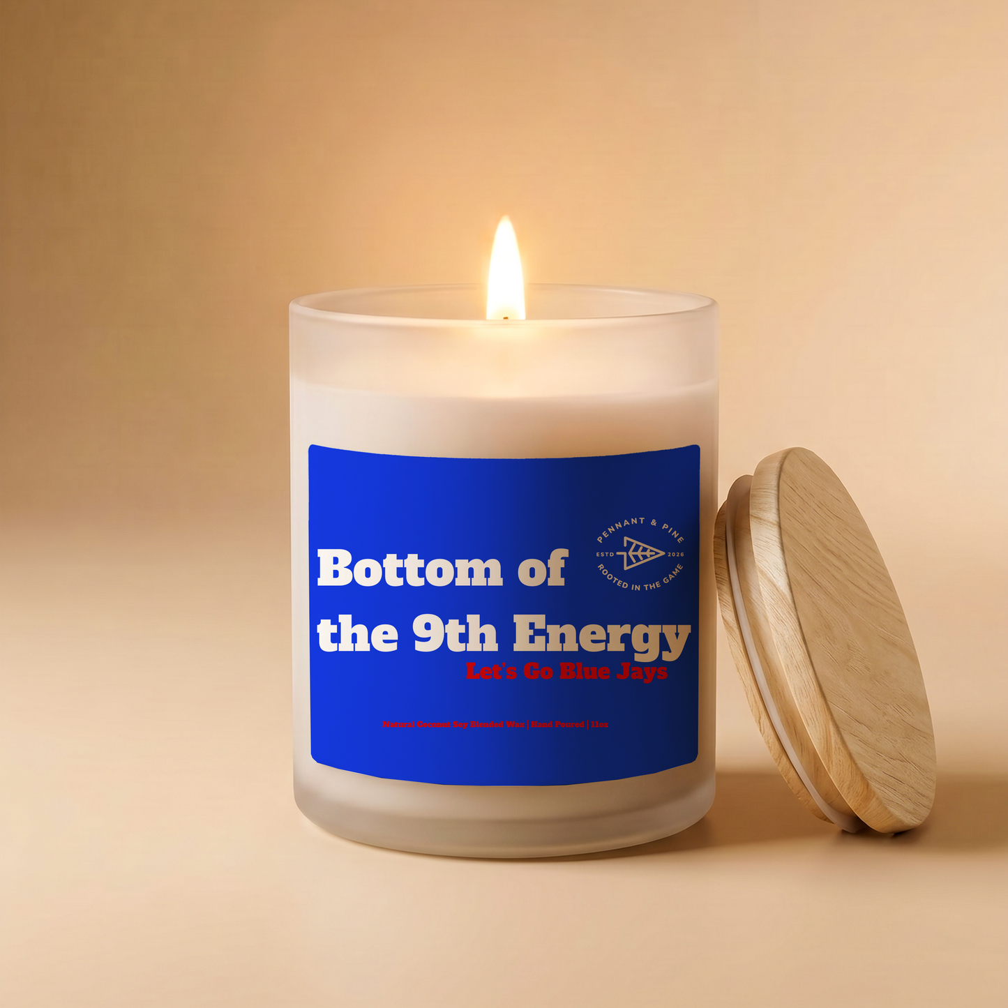 Candle with a blue label on a beige background