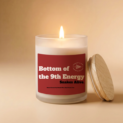 Candle with a red label on a beige background