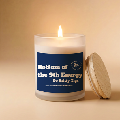 Candle with a blue label on a beige background