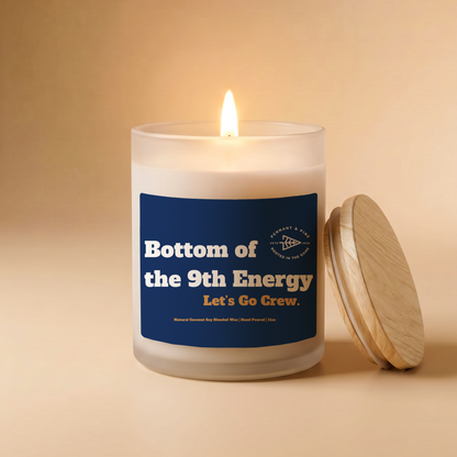 Candle with a label on a beige background