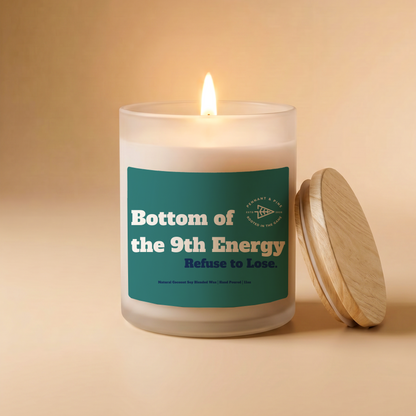 Candle with a green label on a beige background