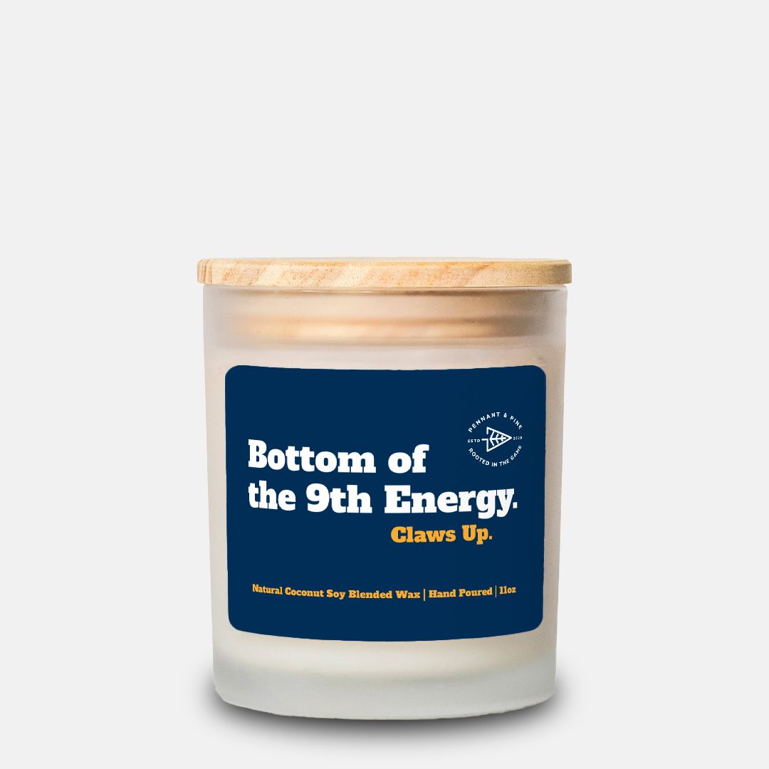 Candle with a blue label on a white background