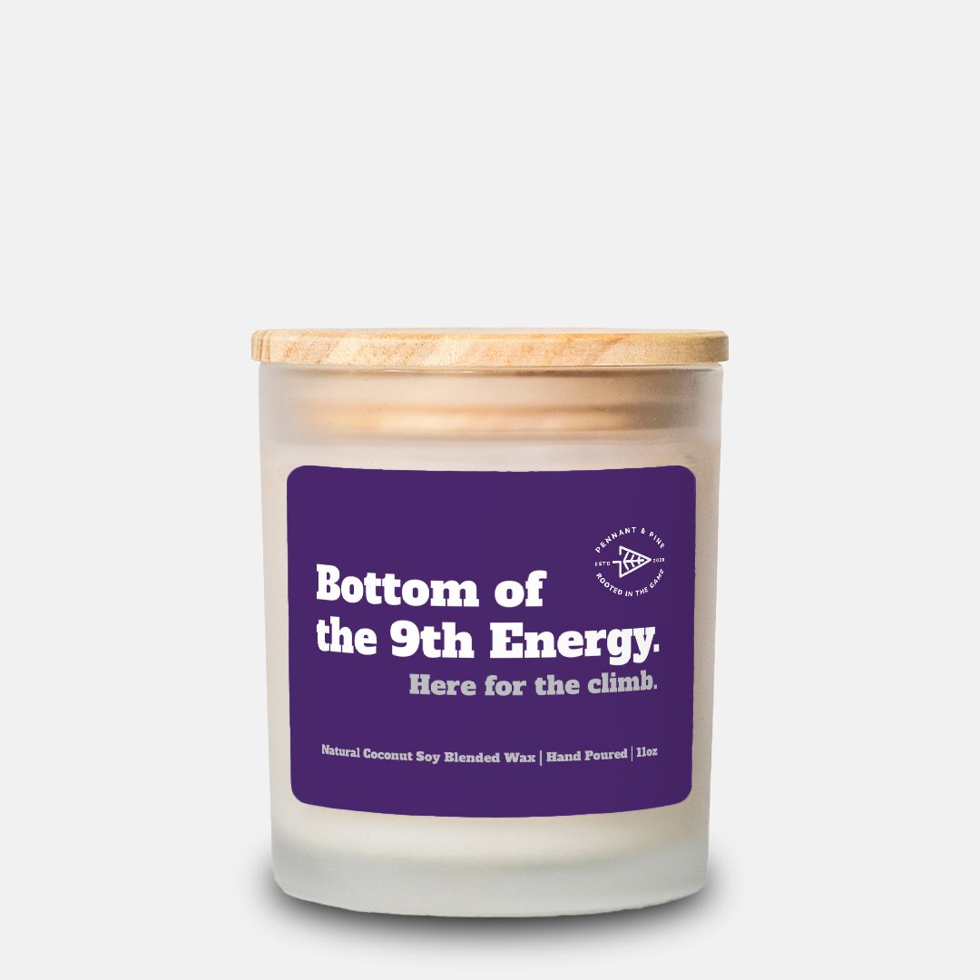 Candle with a purple label on a white background