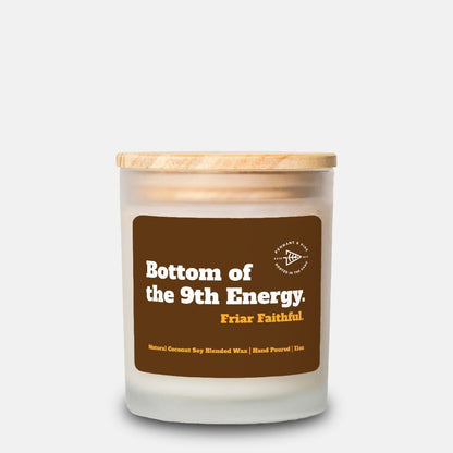 Candle with a brown label on a white background
