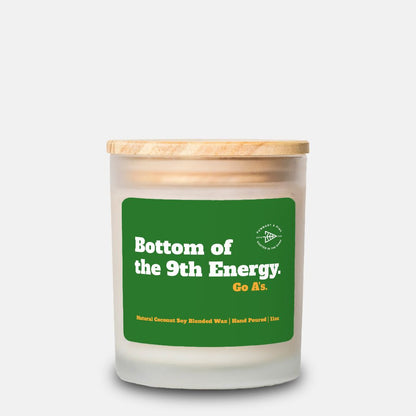 Candle with a green label on a white background
