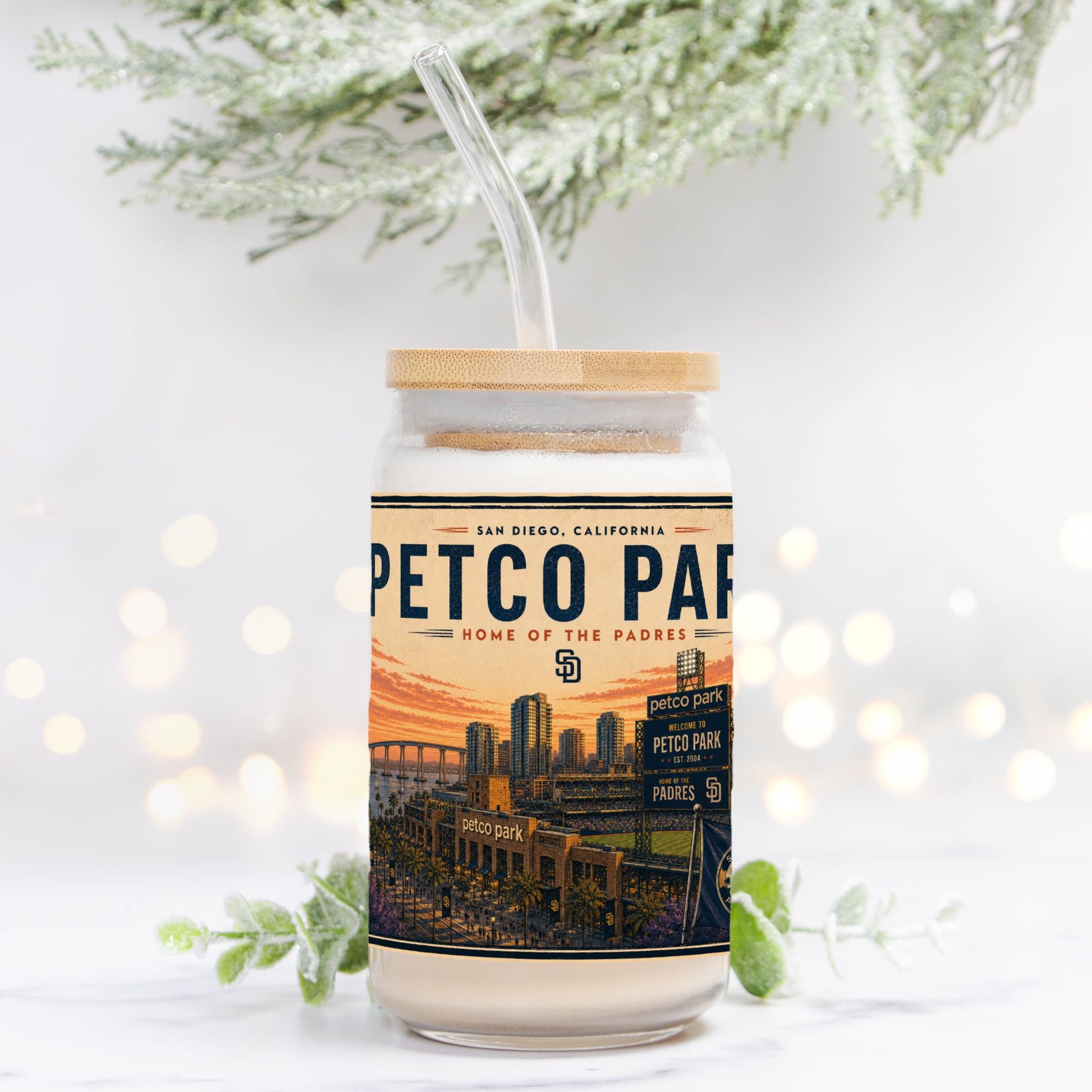 Tumbler with Petco Park design on a white background with blurred lights and greenery.