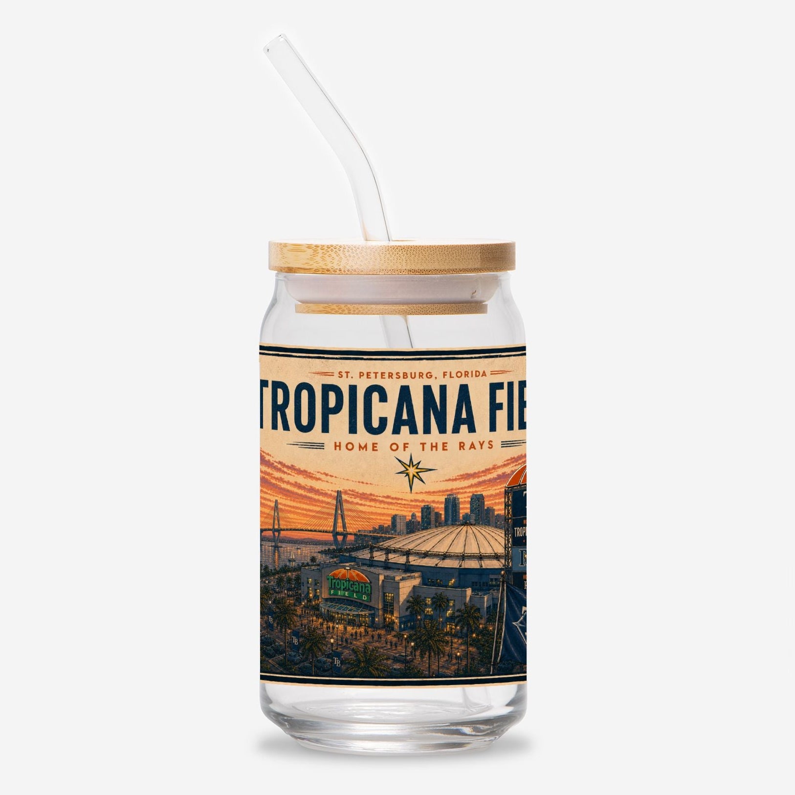Glass tumbler with straw featuring Tropicana Field design on a white background