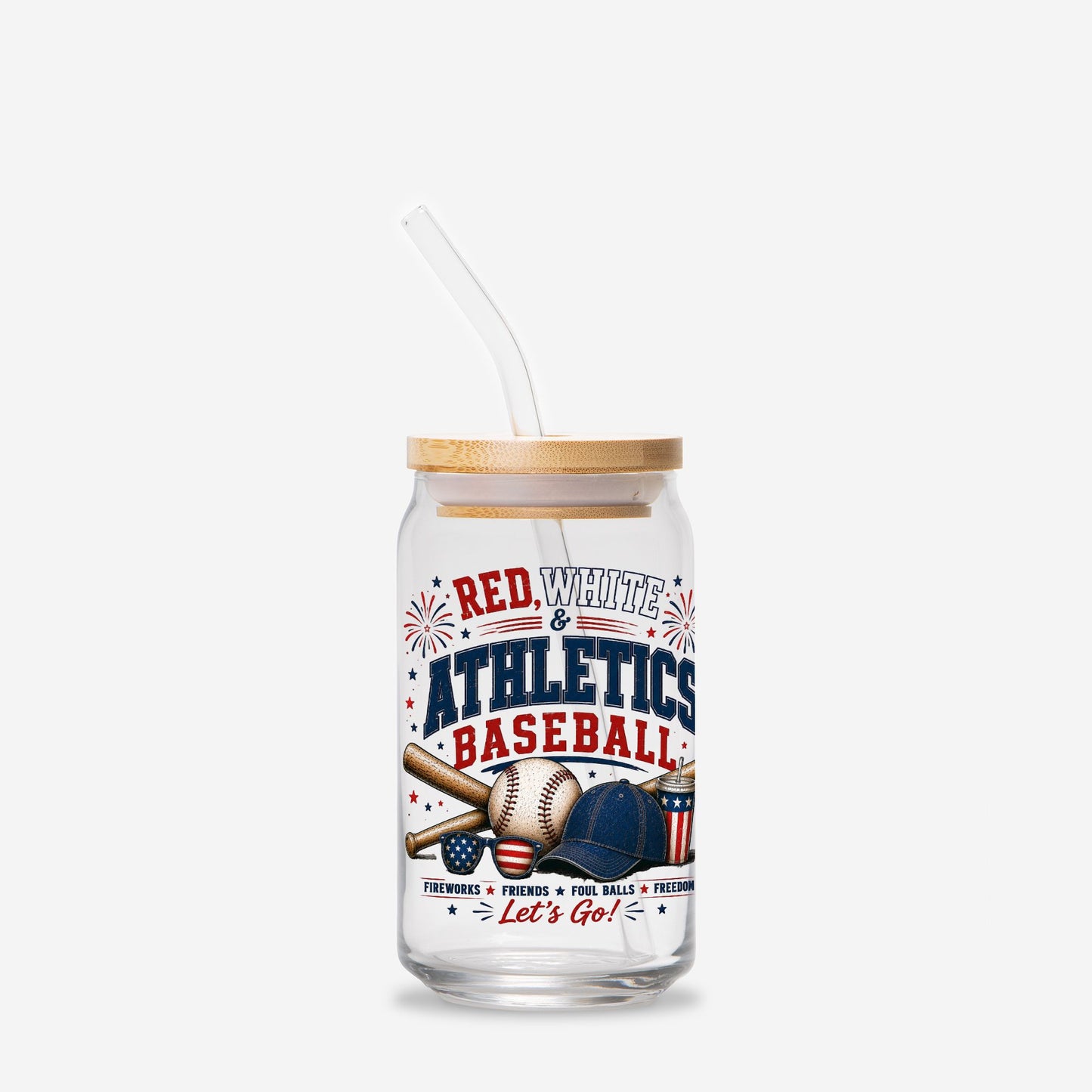 Glass tumbler with straw featuring a baseball design and text on a white background